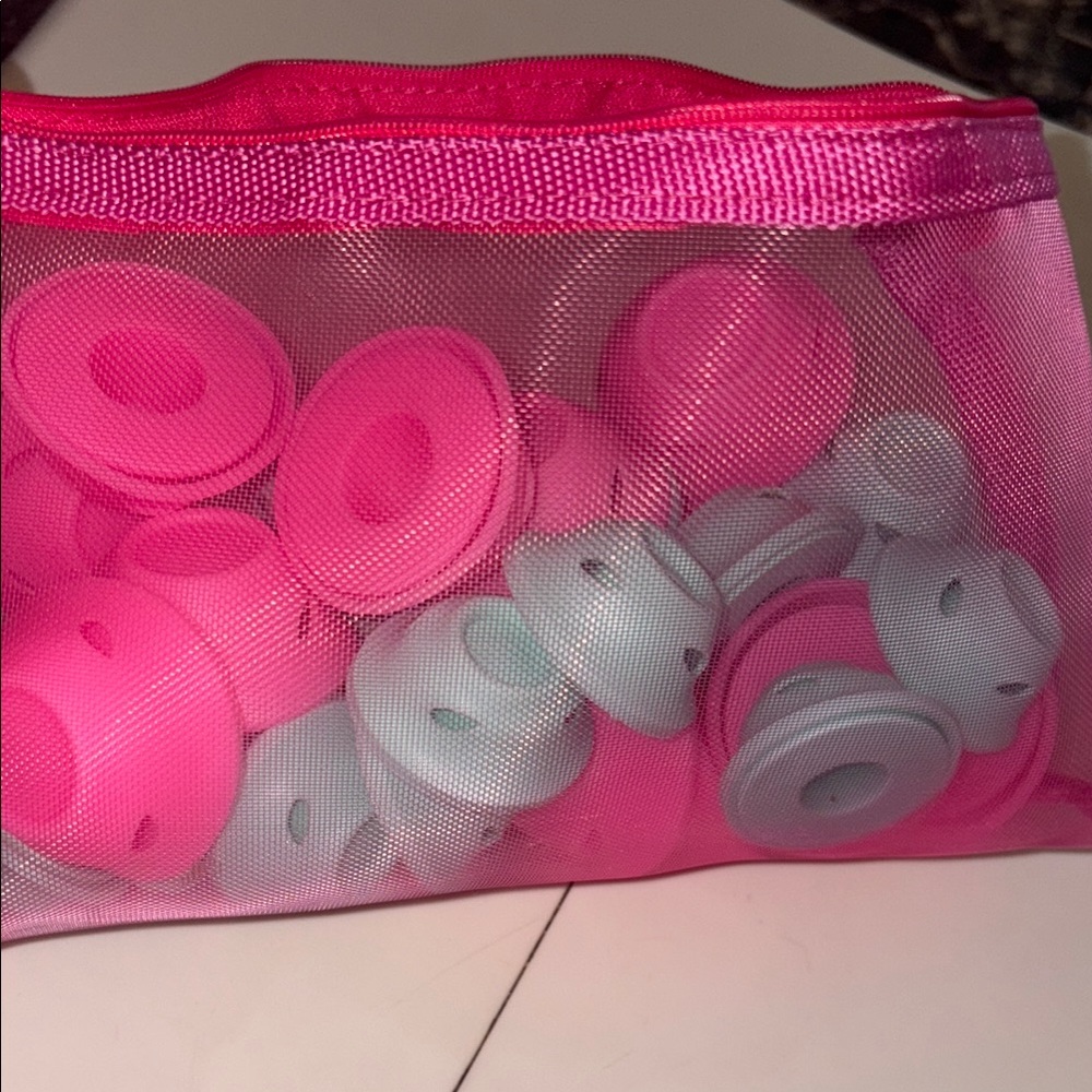 Pink and White Mesh Bag with Accessories